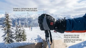 Illustration highlighting the reinforced leather palm and grip of heated ski gloves, ideal for handling ski poles or shoveling snow.